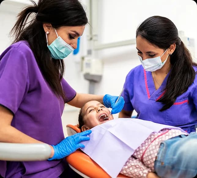 Dental professional with patient