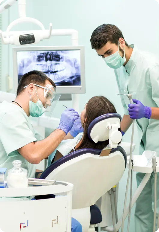 Patient and dental team at Magnum Dental Clinic