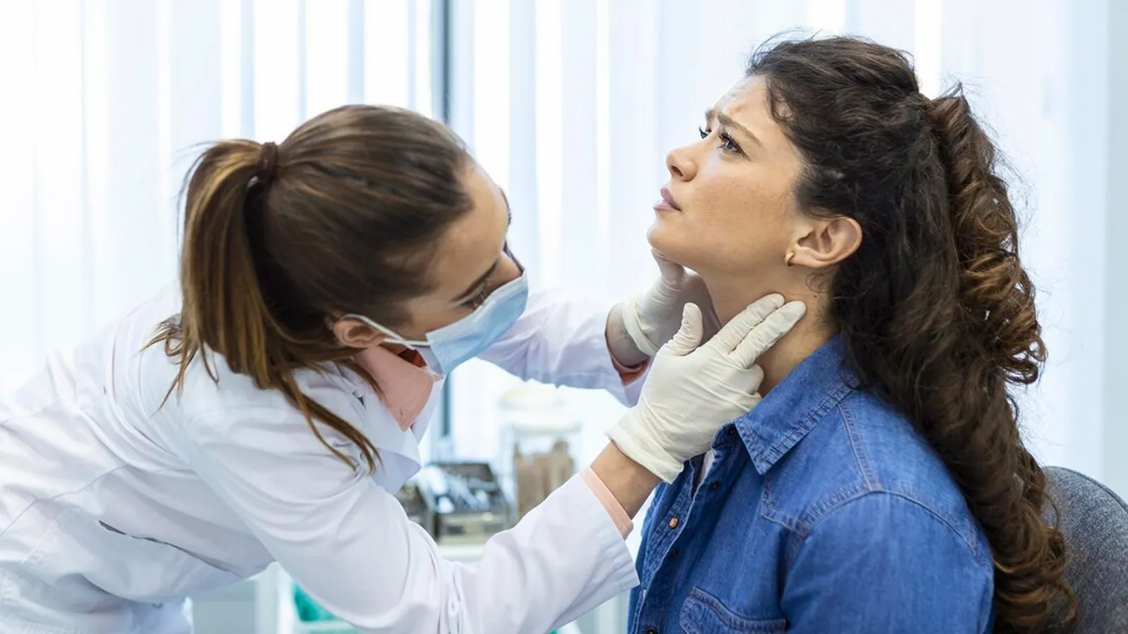Patient in dental chair during teeth extraction consultation