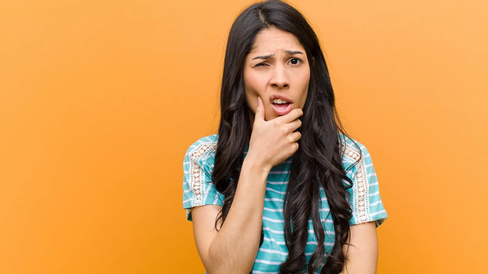 Patient in dental chair during teeth extraction consultation