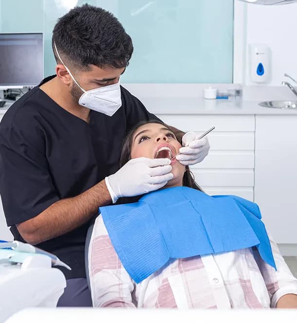 Patient in dental chair during teeth extraction consultation