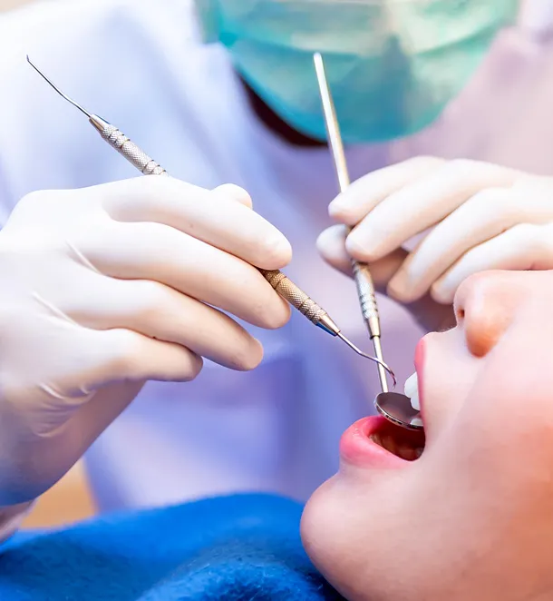 Patient in dental chair during teeth extraction consultation