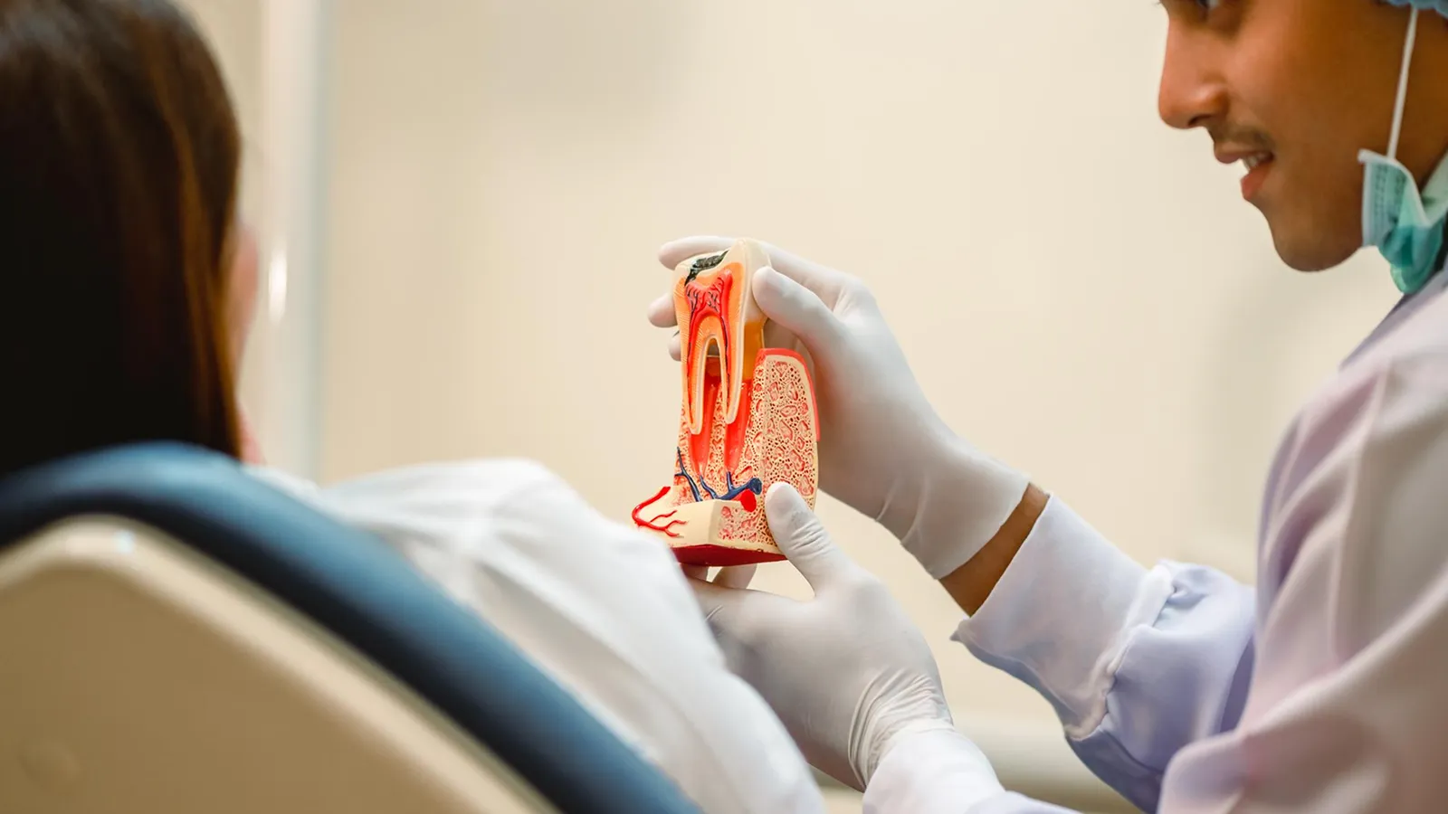 Patient in dental chair during teeth extraction consultation